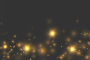 The dust sparks and golden stars shine with special light. Vector sparkles on a transparent background. Christmas light effect. Sparkling magical dust particles