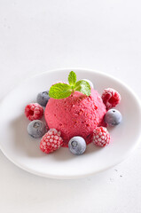 Raspberry sorbet on plate