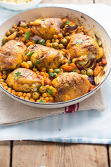 Chicken tagine casserole with olives, preserved lemons and chickpeas 