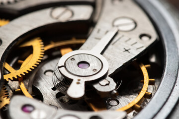 The mechanism of analog hours. A photo close up