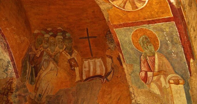 Wall frescoes and paintings on the walls of the ancient Orthodox Church of St. Nicholas the Wonderworker in the city of Demre in Turkey. The concept of the historical ancient sights of Turkey