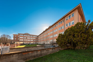 Saluzzo, Piedmont, Italy - February 3, 2023: Saluzzo ASL Cuneo 1 Civil Hospital building in Via Spielberg
