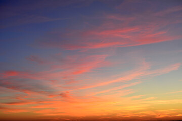 Fototapeta premium sunset sky with purple, orange, yellow, red and pink clouds isolated