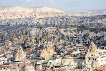 Fototapeta premium Göreme town as seen from the peak of a mountain.