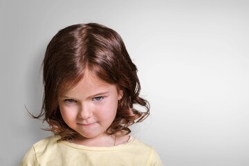 Cute small scared school child for studying