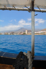 Part of an old sailing ship facing the coast