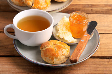 Homemade scones served with butter and marmalade