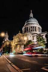 Fototapeta na wymiar St Paul's Cathedral in London by night with light trails long exposure england
