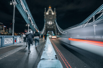 London Bridge over Thames in London by night with light trails long exposure