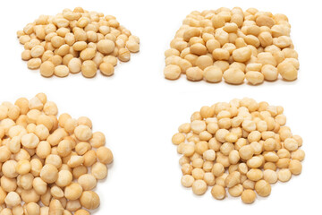 Macadamia nuts isolated on white background.