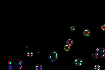 Soap bubbles isolated on a black background.