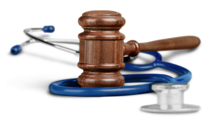 Wooden gavel and stethoscope on white background