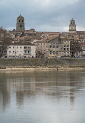 Arles, Provence, France, View over the old village historical buildings as seen from the banks of...