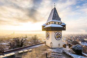 The Uhrturm at the Schloßberg hill, the landmark of the UNESCO heritage city of Graz in Austria - obrazy, fototapety, plakaty