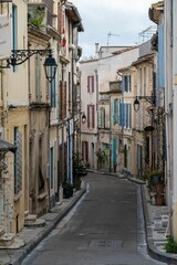 Fototapeta na wymiar Arles, Provence, France, Typical narrow and steep street in old town