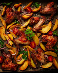 Fried chicken wings, with potatoes, and spices, homemade, fast food, no people,