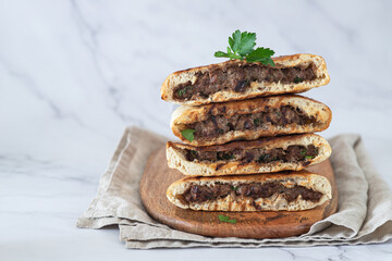 Arayes- pita bread filled with a mixture of minced meat with different spices