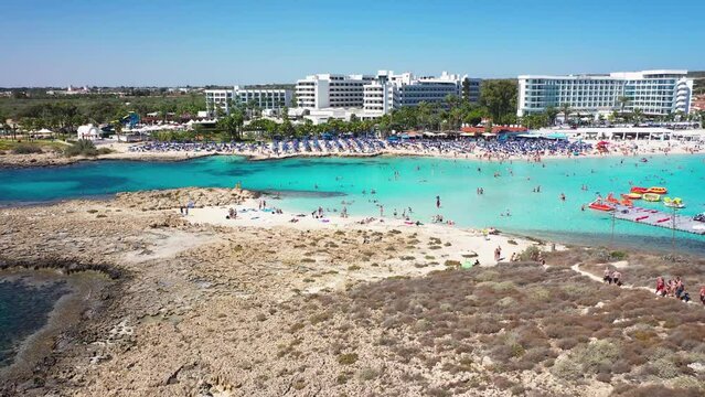 Nissi Island next to Nissi beach in Ajia Napa resort in Cyprus, 4k drone video