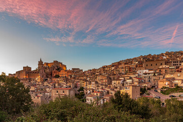 Fototapeta na wymiar Skyline of the medieval village of Caccamo at dusk, province of Palermo IT