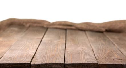 Old wooden table with a piece of burlap