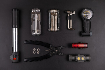 Bicycle tools on black background
