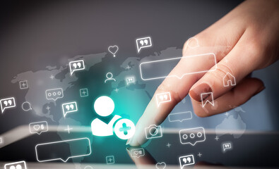 Close-up of a hand using tablet, social media concept