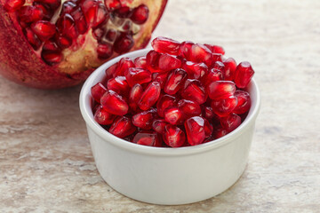 Ripe red Pomegranate seeds in the bowl