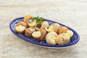 Delicous baked snail with butter - Escargot