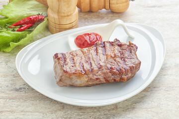 Grilled rib-eye steak beef meat