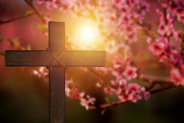Holy wooden cross on nature background