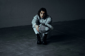 beautiful man fencer with a foil rapier sword