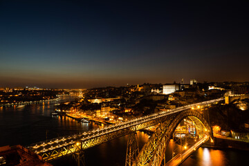 Fototapeta na wymiar porto city by night with bridge