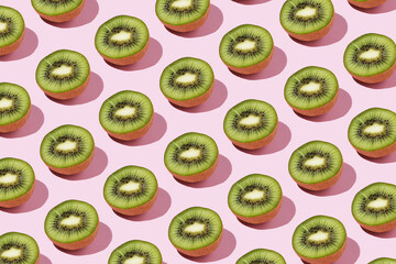 Seamless pattern of slice kiwi fruits. Minimalist isometric food texture of healthy food on pink background.