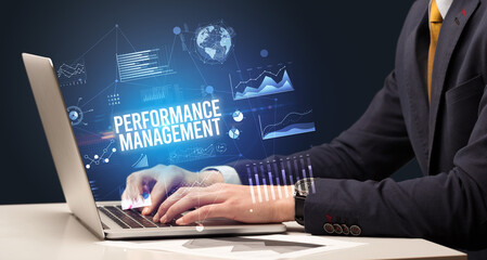 Businessman working on laptop, business concept