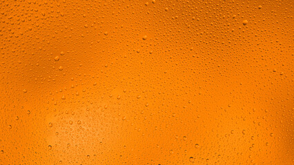 Glowing gradient orange background with contrasting water drops