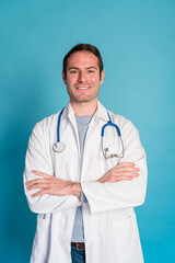 Smiling doctor with crossed arms