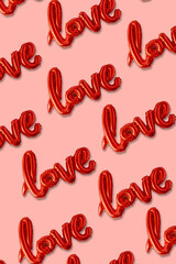 Love balloon word over pink background isolated, Valentine's Day