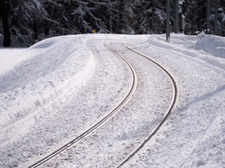 Snow covered train track in Engadin, Grisons, Switzerland