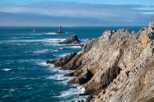 Natural Beauty of Ocean, Rock Formations and Lighthouses in this Coastal Image at the pointe du raz in Britain