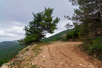 Country road with mud at Penteli mountain at Attica, Greece.