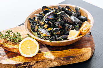 fragrant boiled mussels in herb and cream sauce