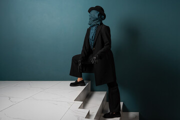 Unknown. Nobody, the concept of the identity crisis. An impersonal person. A person in a coat and...