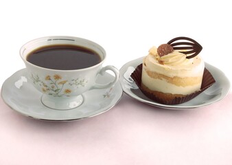 cup of hot coffee and cakes close up