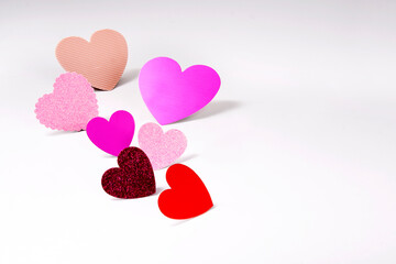 paper hearts on light background AND COPYSPACE
