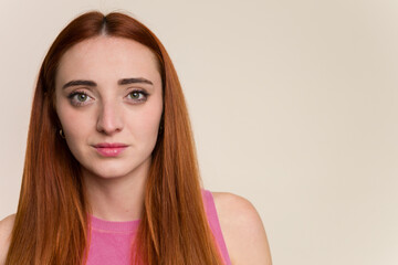 Young red hair woman face closeup isolated