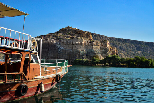 Medieval and Late Rome dated castle called Rumkale riverside of Euphrates in Gaziantep viewing near a boat or ship