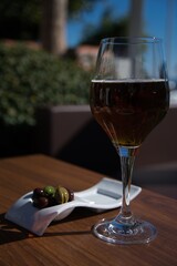 Toasted beer and green and black olives appetizer