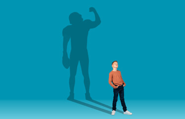 Fototapeta premium Rugby football player shadow over dreamy ginger guy schooler