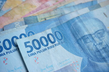 Stock photo of Indonesian rupiah, the official currency of Indonesia. world currency - obrazy, fototapety, plakaty