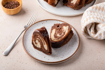 Chocolate marble bundt cake with chocolate glaze drizzled on top